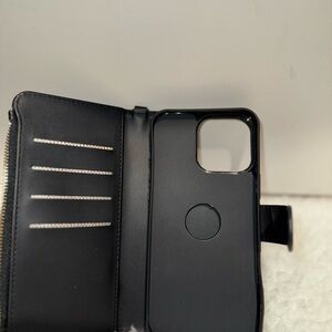 iPhone 16 pro max 
Black Phone Wallet Case